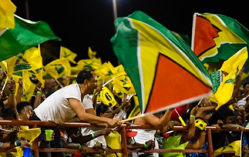 PROVIDENCE, GUYANA - SEPTEMBER 09:  In this handout image provided by CPL T20, Supporters of Guyana Amazon Warriors during match 30 of the Hero Caribbean Premier League between Guyana Amazon Warriors and Trinbago Knight Riders at Guyana National Stadium on September 9, 2018 in Providence, Guyana. (Photo by Randy Brooks - CPL T20/Getty Images) *** Local Caption ***