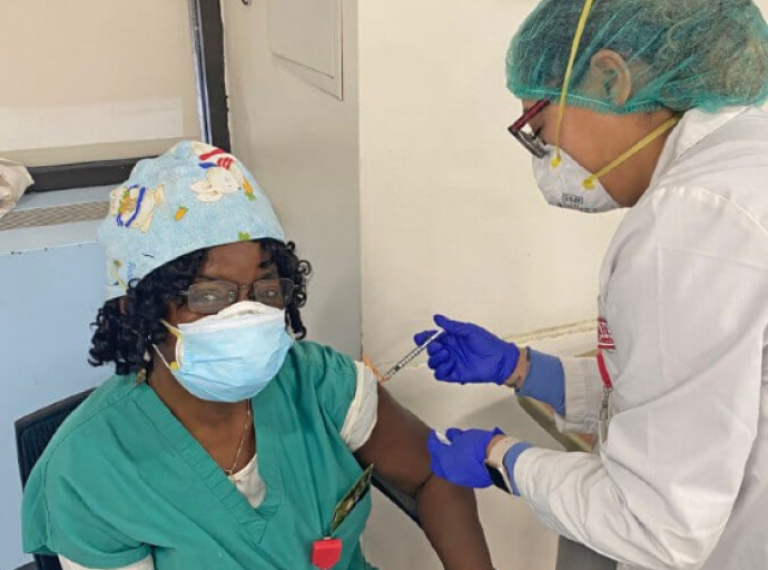 Trinidadian Dr. Yolande Thomas-Badal, receiving vaccine.