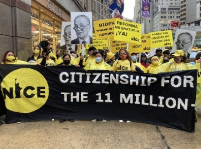 Members of New Immigrant Community Empowerment and the New York Immigration Coalition marching down Manhattan.