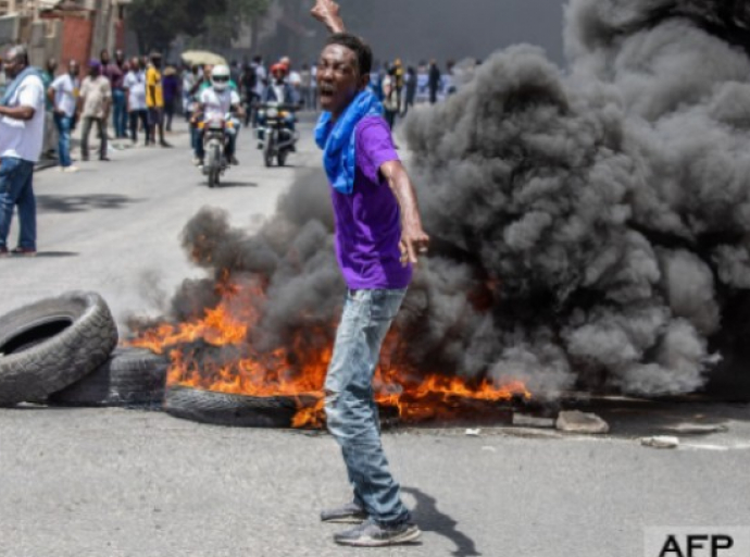 Haitians Urge Prime Minister Henry to Declare State of Emergency