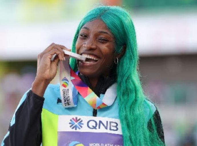 Bahamian Shaunae Miller-Uibo celebrates her first-ever World Championships 400m gold.