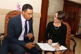 Prime Minister Andrew Holness and Foreign Affairs and Foreign Trade Minister, Kamina Johnson Smith discuss legislation. (via @AndrewHoldnessJM on Twitter)