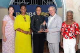 Acting Prime Minister, Santia Bradshaw receives a token of appreciation from Mayor of Charleston, South Carolina, John J. Tecklenburg – looking on are (left to right) – President of South Carolina National Heritage Corridor, Michelle MCCollum; President and CEO of the International African American Museum, Dr. Tonya Matthews; and Honorary Consul for Barbados in South Carolina, Rhoda Green.