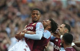 Jamaican winger Leon Bailey celebrates with teammates after scoring at Villa Park on Saturday.