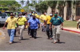 Trade union leaders lead the march against the government proposed cuts on Monday