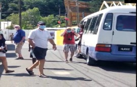 Tourists seen leaving a bus in St. Lucia, taken from a viral video.