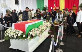 Guyana’s President Dr. irfaan Ali saying a final goodbye to “my brother” former Suriname president Chan Santokhi.