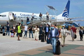 Passengers arriving on Copa Airlines as it returned to Barbados.