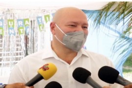 Health and Wellness Minister, Michel Chebat, speaking to reporters