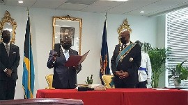 Prime Minister Phillip Davis being sworn into office on Friday