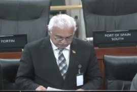 Health Minister Terrence Deyalsingh reading statement in Parliament on Friday regarding the deaths of seven babies from a bacteria outbreak (CMC Photo)