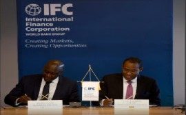 Finance and the Public Service Minister, Dr. Nigel Clarke, and IFC managing director, Makhtar Diop sign agreement (JIS Photo)