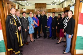 Minister of Foreign Affairs and Foreign Trade, and Leader of Government Business in the Senate, Hon. Kamina Johnson Smith (right); Clerk to the Houses of Parliament, Valrie Curtis (second right) and President of the Senate, Hon. Tom Tavares-Finson (left), share a photo opportunity with several Heads of Missions during a recent sitting of the Senate, where Minister Johnson Smith recognized the 60th anniversary of diplomatic relations with 12 bilateral partners. (Photo by Adrian Walker via JIS)