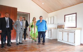 Prime Minister Dr. Ralph Gonsalves (in blue shirt) with his wife, Eloise, as well as other government officials during a tour of the DuraVilla houses in Guyana (Photo: DPI)