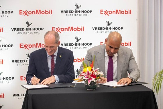 (Left) President, ExxonMobil Guyana, Alistair Routledge and well-known businessman and miner, Andron Alphonso (Right) during the signing of the agreement.