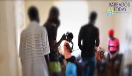 Haitians in an apartment in Barbados (Photo courtesy Barbados TODAY)
