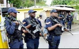 Police officers patrolling in Spanish Town in Jamaica