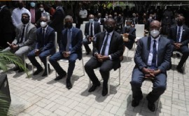 Haiti’s new Prime Minister Dr. Ariel Henry (R) attends an official ceremony in honor of assassinated President Jovenel Moise in Port au Prince