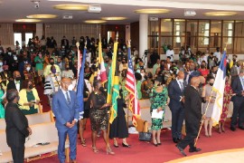 Flag bearers enter the sanctuary in Takoma Park, Maryland, signaling the commencement of the Thanksgiving Service to mark Jamaica’s Diamond Jubilee and 184 years of Emancipation. Leading the procession is Rick Nugent, president of the Jamaican Association of Maryland. Bearing the Jamaica flag is Mrs. Kerry Anderson-Dixon (right) and Mrs. Ingrid Jallier (with the USA flag), both Embassy staff members. –at right is Ambassador Audrey Marks. (Photo by Derrick A Scott)