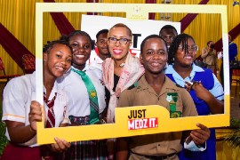 Education and Youth Minister, Hon. Fayval Williams (third left), engages with students from Denham Town, Calabar, and Gaynstead High Schools. The event was the launch of the Ministry’s violence prevention initiative, ‘Just Medz It’, on Wednesday (October 19), at Wolmer’s Boys’ School in Kingston. (Photo by Adrian Walker via JIS)