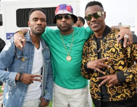 Wayne Wonder (right) with Ginuwine (green shirt) and Ginuwine's DJ at the May 6 Lovers And Friends Festival in Las Vegas.