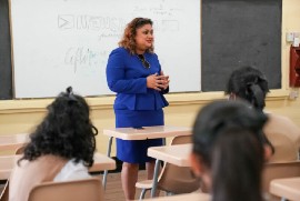 Minister of Education Priya Manickchand engaging Grade Seven students at Queen’s College on May 3rd.