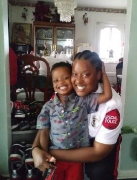 Special Police Officer Maurica Manyan and her 4-year-old son in hipper times.