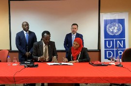 Back, left to right are U.S. Embassy Chargé d’Affaires Shante Moore and Acting Regional Representative of USAID/ESC David Billings. Front left to right are Minister of National Security Fitzgerald Hinds, and UNDP’s Assistant Resident Representative Trinidad and Tobago Sharifa Ali Abdullah. (via US Embassy in Trinidad and Tobago)