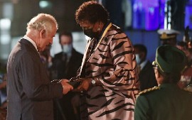 President Dame Sandra Mason hands over honorary Order of Freedom of Barbados award to Britain’s Prince Charles (WPA POOL / GETTY IMAGES NORTH AMERICA / Getty Images via AFP)