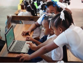 Students in Dominica learning online. Image taken from The Rotary Foundation.
