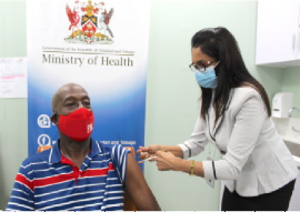 Prime Minister Dr. Keith Rowley taking a vaccine against COVID-19 earlier this week