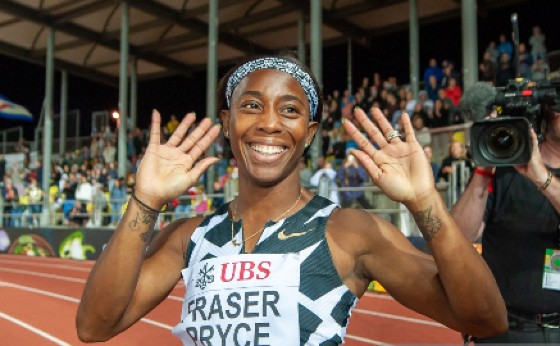 Shelly-Ann Fraser-Pryce celebrates her victory in Lausanne on Thursday.
