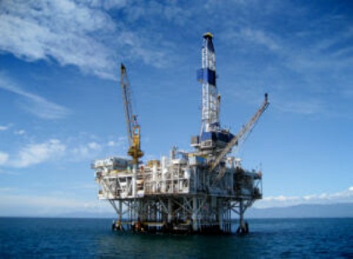 Large Pacific Ocean oil rig drilling platform off the southern coast of California.