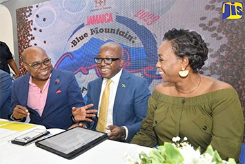  Sharing a light moment during the launch of the Jamaica Blue Mountain Coffee Festival are (from left): Minister of Tourism, Hon. Edmund Bartlett; Minister of Agriculture and Fisheries, Hon. Pearnel Charles Jr. and Member of Parliament for St. Andrew East Rural, Juliet Holness. The event was held at Devon House in Kingston on January 9. (Photo courtesy of Michael Sloley via JIS)