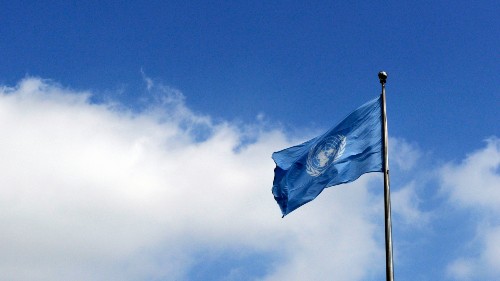 The United Nations flag flies against a blue sky on the opening day of the general debate of the sixty-fifth General Assembly.
