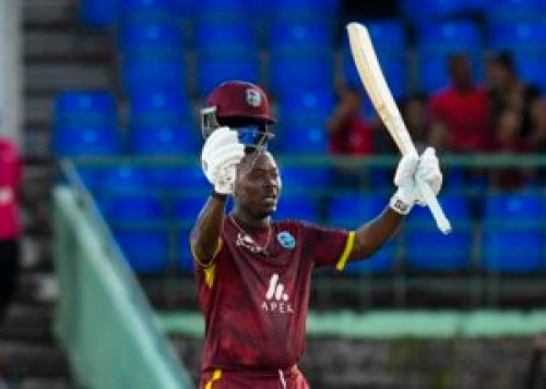 Sherfane Rutherford of West Indies celebrates his century during the 1st ODI between West Indies and Bangladesh at Warner Park, Basseterre, Saint Kitts and Nevis, on Dec 08, 2024.