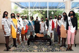 The Miss Jamaica Festival Queen Patron, the Hon. Olivia Grange, Minister of Culture, Gender, Entertainment and Sport (centre) is surrounded by the all 13 Parish Queens of the 2021 competition, post their Breakfast Courtesy Call at the Jamaica Pegasus Hotel in Kingston on Thursday.