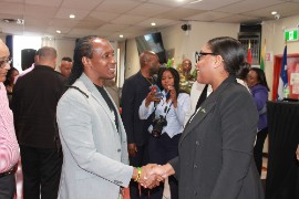 Photo: Monique Broughton, chief representative officer of the JN Bank Canada Representative Office greets the Hon Alando Terrelonge, Jamaica’s Minister of State in the Ministry of Foreign Affairs and Foreign Trade, at a Jamaican Diaspora Townhall, held at the Jamaica Association of Montreal in May 2026. The Townhall was part of the lead-up activities executed across Canada by the Government in collaboration with key institutions for the 11th Biennial Jamaica Diaspora Conference.
