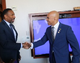 Jamaica’s Ambassador to the United States, His Excellency Major General (Ret’d) Antony Anderson (left), greets Atlanta Mayor Andre Dickens upon his arrival at the Buckhead Club in Atlanta for talks on deepening the Atlanta–Jamaica relationship in investment, trade Tourism , and culture on Sunday, May 3, 2026. (Photo by Derrick Scott)