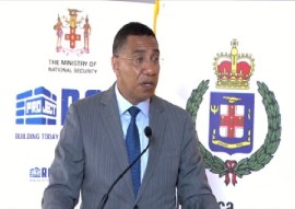 Prime Minister Andrew Holness addressing the contract signing ceremony for the St. Catherine Divisional Headquarters. (CMC Photo)