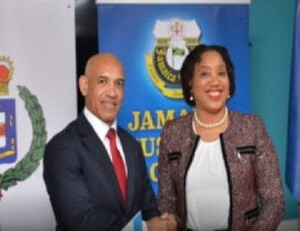 Commissioner of Customs, Velma Ricketts Walker, (Right) and Commissioner of Police, Major General Antony Anderson (JIS Photo)