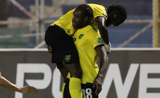 Michail Antonio (#18) celebrates with a teammate after scoring for Jamaica recently.