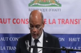 Prime Minister Dr. Ariel Henry addressing the installation of three members of the High Council of the Transition (HCT)