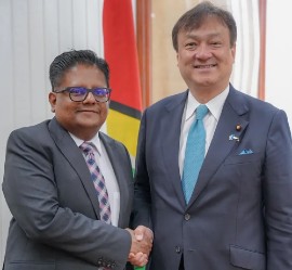 Finance Minister Dr. Ashni Singh with the State Minister of Foreign Affairs of Japan, Iwao Horii. (Photo credit: DPI)