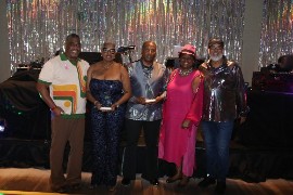 Jamaica’s Honorary Consul to Atlanta, Dr Elaine Bryan (second right), shares a light moment with, from left, Dr Joseph Dove, Dr Yvonne Smith Blake, CEO of the Montego Bay-Atlanta Cities Committee, Dr Christopher Parker, research associate professor and director of Population and Global Health at the Georgia Health Policy Center, Georgia State University, and JCJ president Junior Taylor at the organizations’ annual fundraising event, All Schools Jamm, held at the Atlanta Marriott Marquis on Saturday, October 10. DR. Smith Blake and Dr. Parker were recipients of JCJ’s Contribution to the Culture Award. (Derrick Scott Photo)