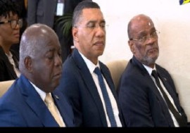 Prime Ministers of the Bahamas, Phillip Davis, (left) Jamaica Andrew Holness (center) and Dr. Ariel Henry of Haiti at the opening ceremony of the conference (CMC Photo)