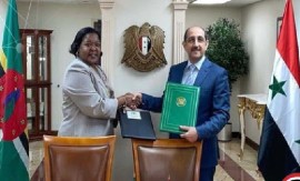 Dominica’s Ambassador Loreen Bannis Roberts and her Syrian counterpart following the signing of “diplomatic” relations between the two countries