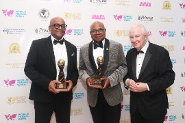 Pictured: Minister of Tourism, Hon. Edmund Bartlett (centre) poses with Donovan White, Director of Tourism (left) and Graham Cooke (right), Founder and President of World Travel Awards.