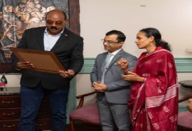 Prime Minister Gaston Browne presents a gift to outgoing Indian Ambassador, Dr. Amit Telang
