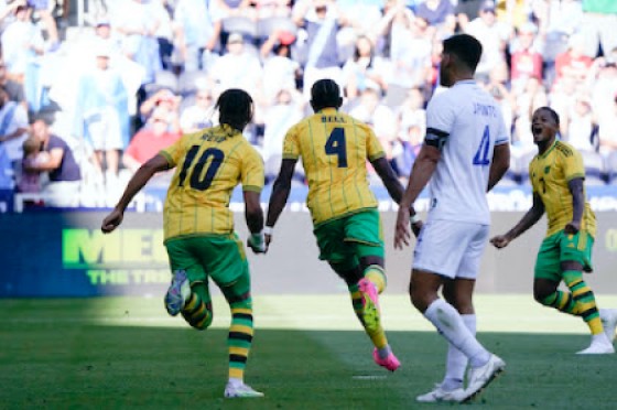 Jamaica Reggae Boyz goal scorer Amari’i Bell (4) celebrates with teammates Bobby Reid (10) and Leon Bailey (7) after scoring against Guatemala in the quarterfinals of the Concacaf Gold Cup on Sunday in the United States. (Concacaf photo)